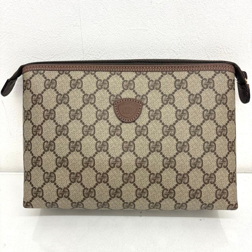 Gucci supreme clutch bag - gg,