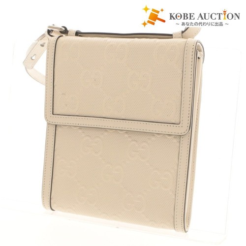 Gucci embossed messenger - gg,